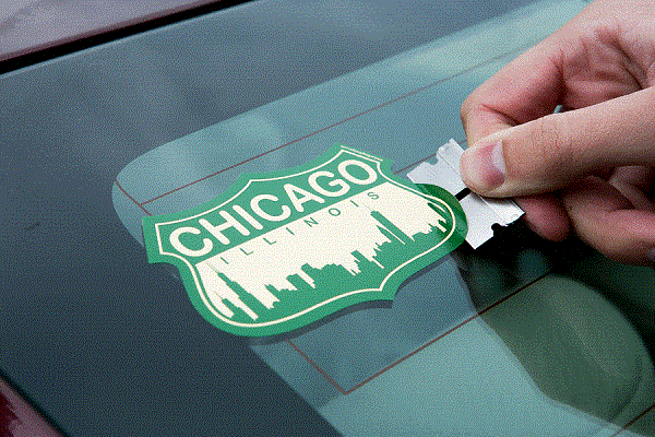 image-of-removing-stickers-from-a-car