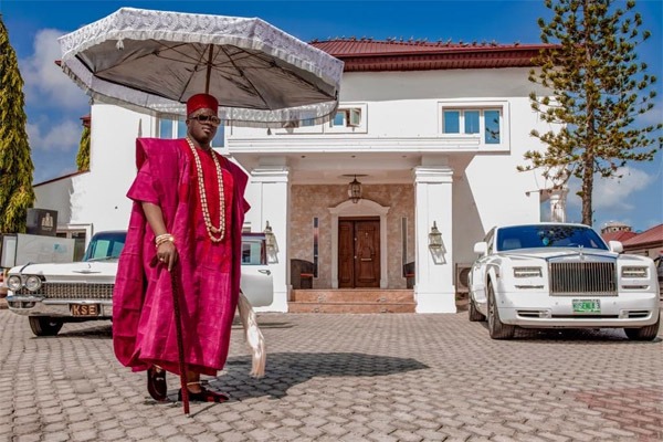 image-of-oba-elegushi-poses-with-rolls-royce-and-1960-deville